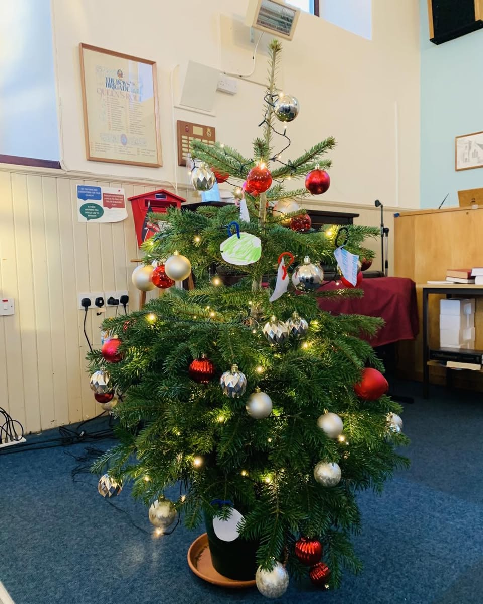 Children Decorate Christmas Tree at Local Church